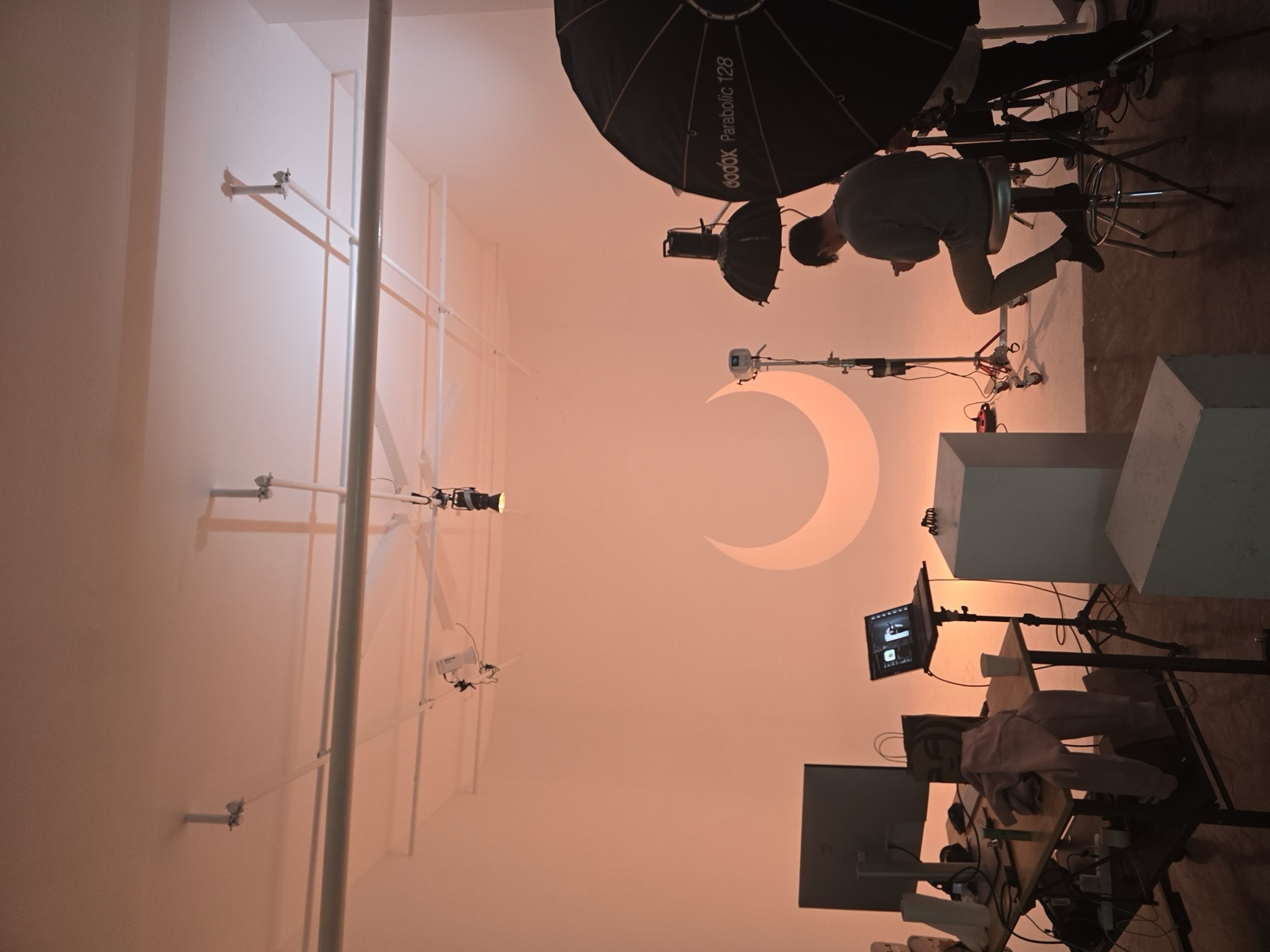 Lighting setup on the cyclorama wall, crescent moon prop