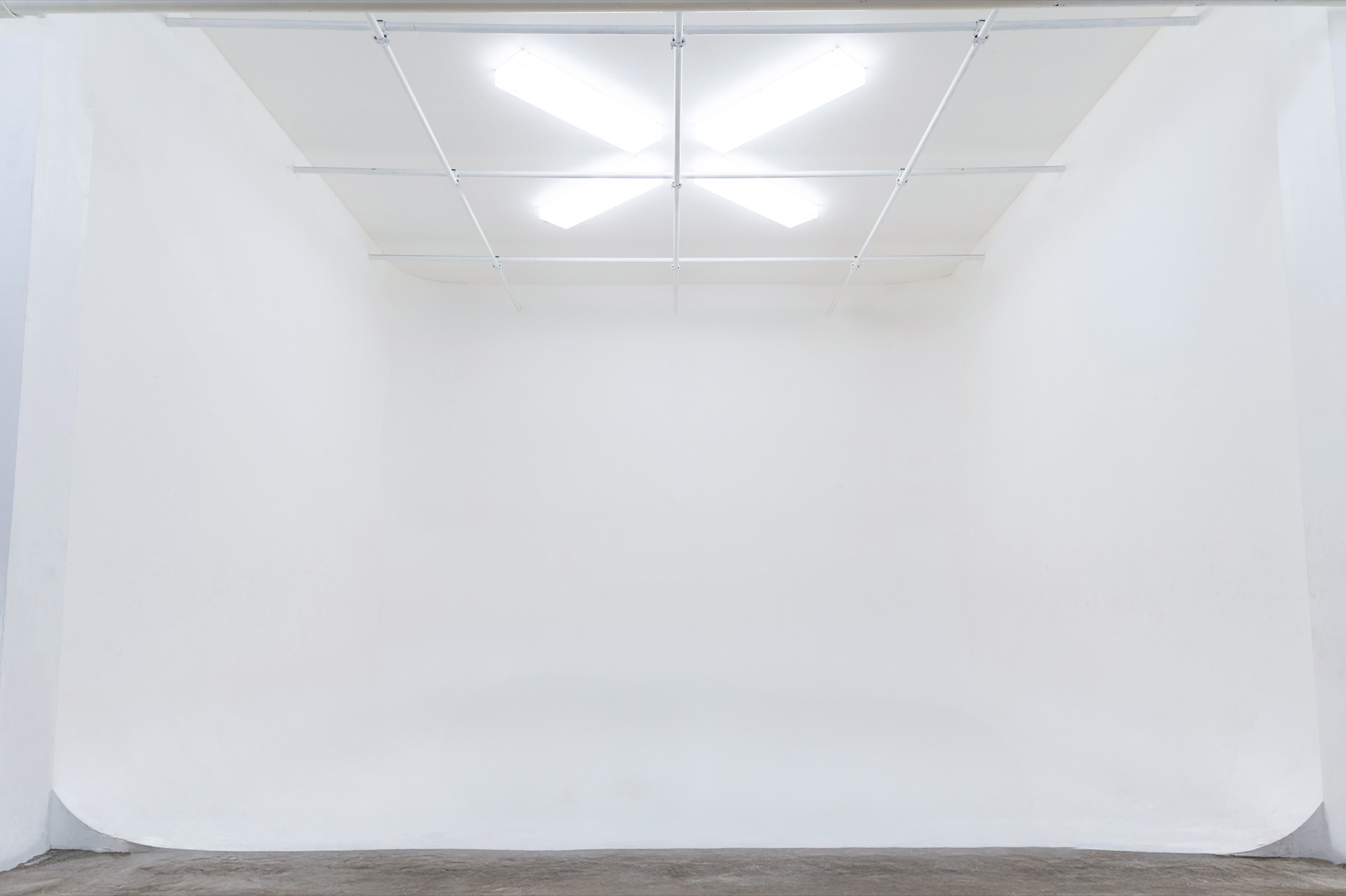 PioneerX seamless white cyclorama wall under studio lights